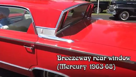 A red car with a breezeway rear window