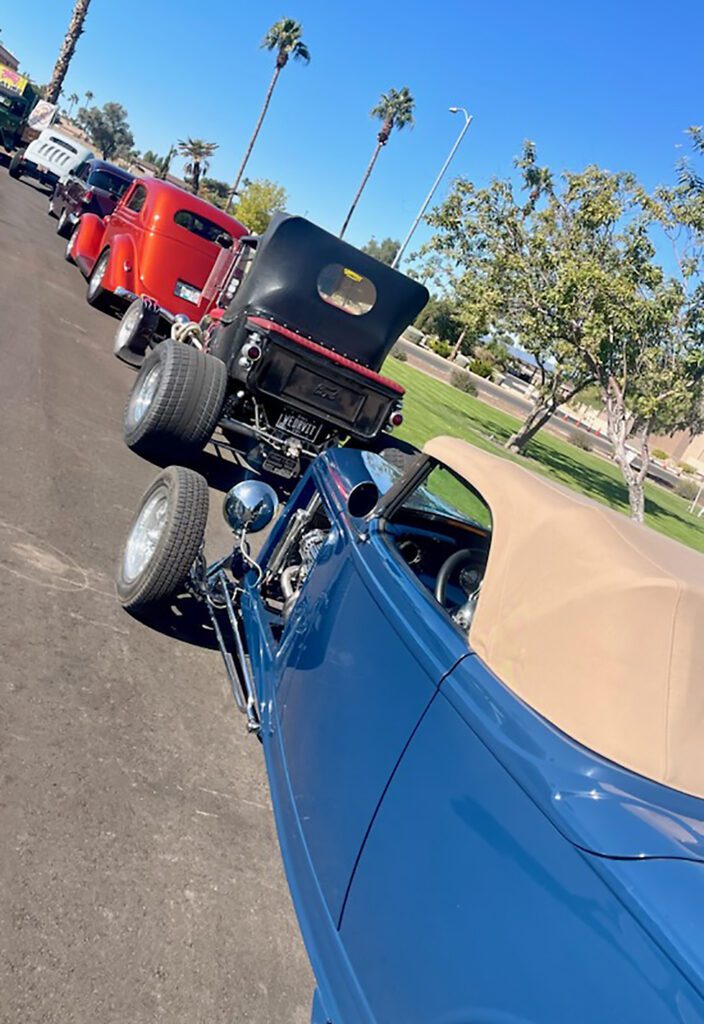 a convoy of vintage cars