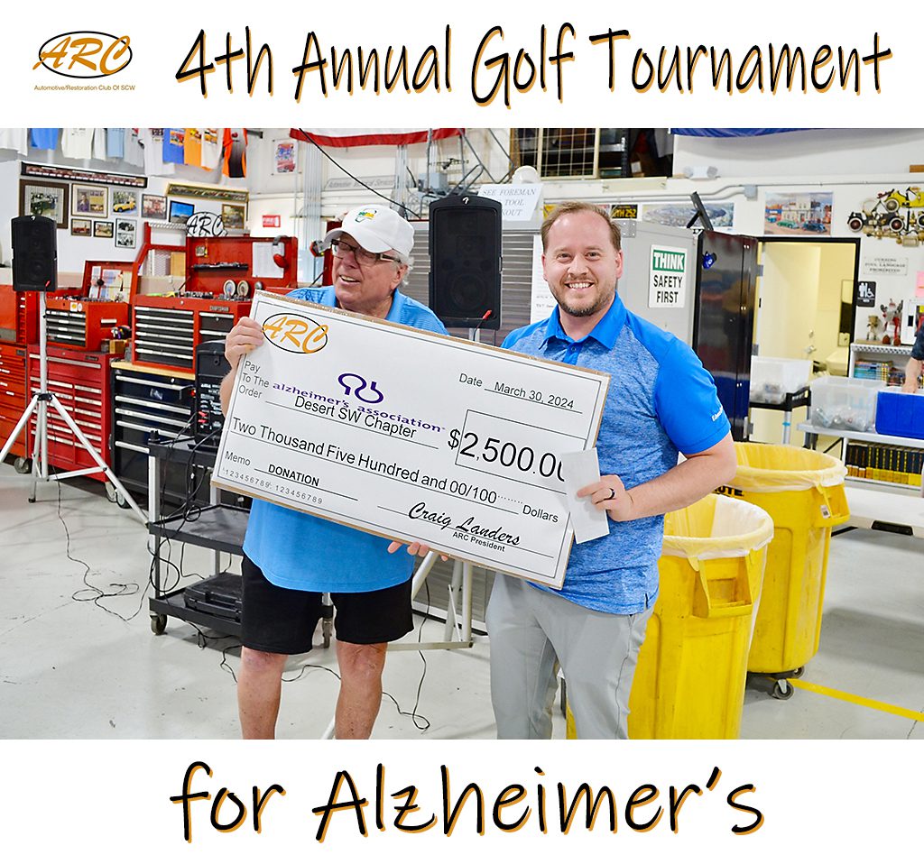 Two men holding a check for Alzheimer's.